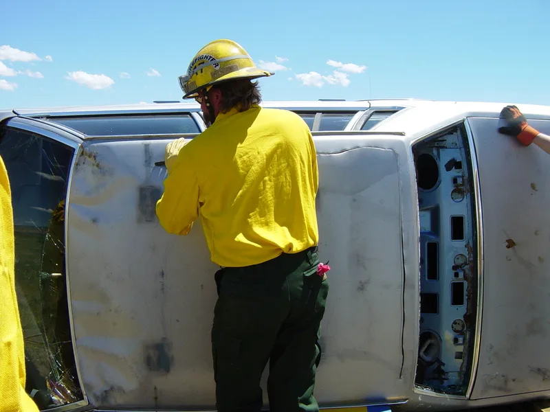 Air chisel starting a roof cut, vehicle on its side picture