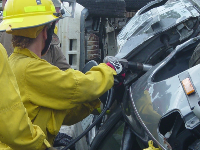 Door being cut off a rollover vehicle with C-10 Air Gun picture