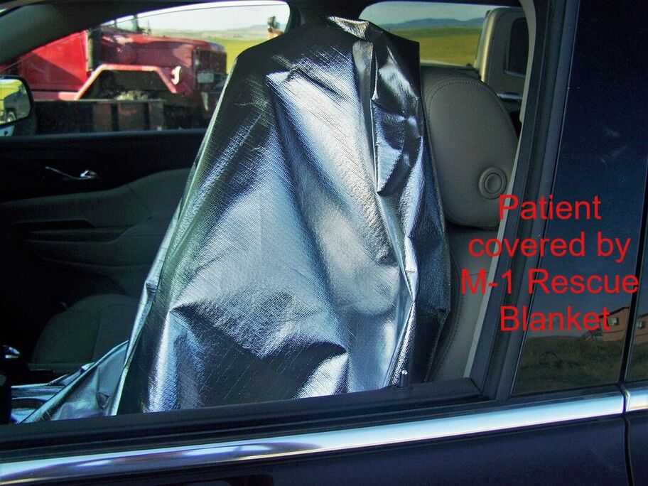 Victim covered with aluminum rescue blanket Picture